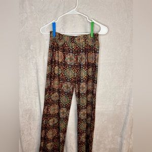 Tight high waisted pants, very colorful, flared on the bottom, size small